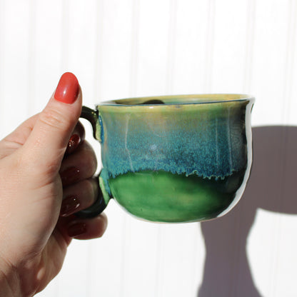 Green Mug with Blue Drip